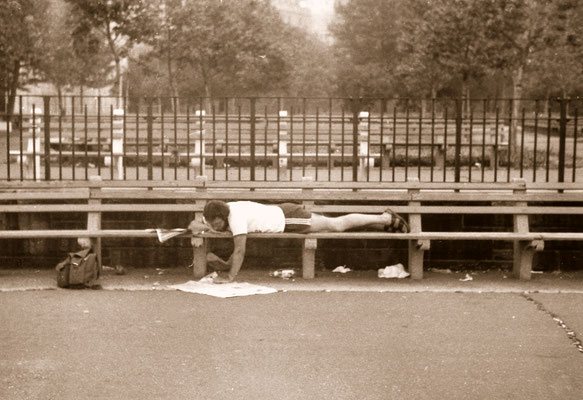 Reading newspaper in Manhatten, 1981.