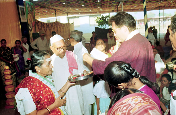 Bride and groom receiving blessings and presents from veteran freedon fighters during the Sarvodaya Sammelan, Savarkundla, Gujarat, 1994.