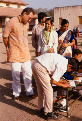 During the first drawing competition "Mahatma Gandhi - As I see him" at Kadvibhai Virani Kanya Vidyalay (KVKV) with teachers and participants in Rajkot, Gujarat, 1991.