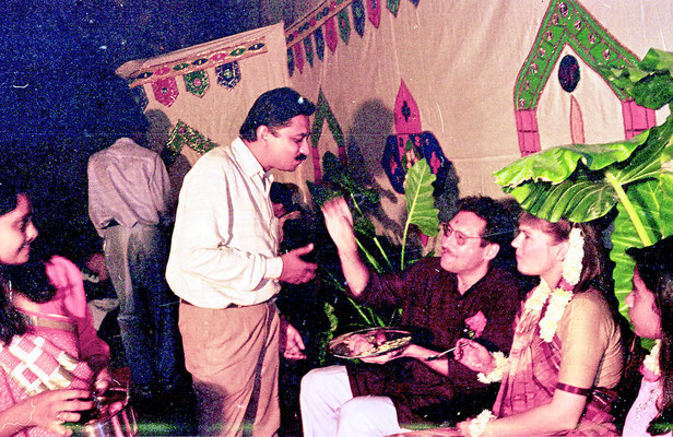 The newly wed couple receiving blessings from Yogeshbhai Goda and his wife Sarojbehn during a reception at Rashtriyashala Ashram, Rajkot, Gujarat, 1994.