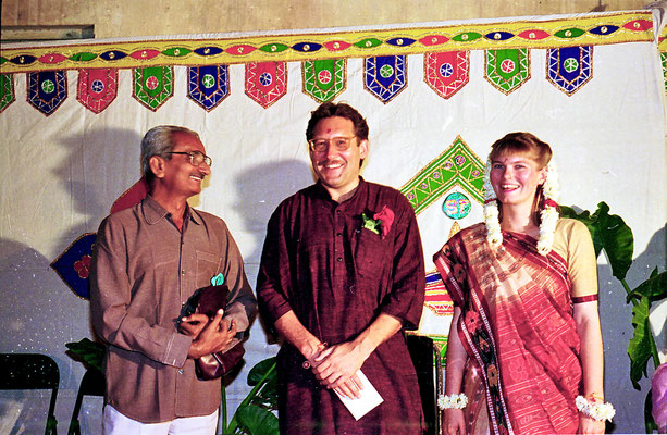 The newly wed couple posing with well-wishers during a reception at Rashtriyashala Ashram, Rajkot, Gujarat, 1994.