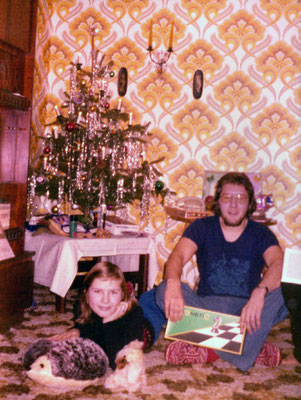 With sister Corinna under the Christmas tree, 1974.