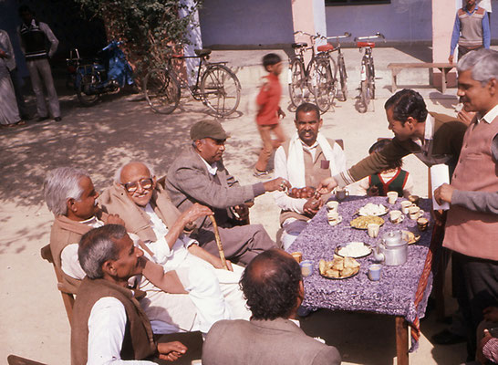Prabhudas Gandhi (left) with former colleagues at Assafpur, U.P., January 24, 1988.