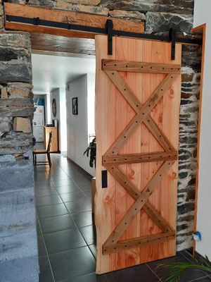 Porte coulissante n Douglas et Chêne
