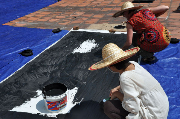 Karin Matsuda and Alsion Eggleton work on base for flag