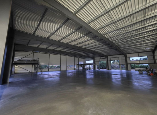 Dallage d'une surface de 2500 m², 18 cm pour un bâtiment de stockage