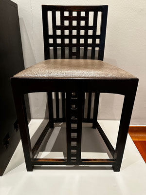 Chair designed by Charles Rennie Mackintosh in the Mackintosh House