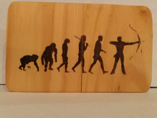 Evolution Bogenschütze auf Holz