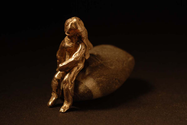 Woman on stone