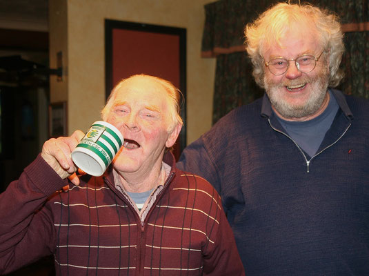 Hughie Rua Duffy who won the Perth Celtic Supporters club mug and tie during the raffle at the Champions League match between Villareal & Celtic in Sharkey's bar Annagry also in the photo is Harald Juengst who organised the raffle (Photo John Rafferty Pho