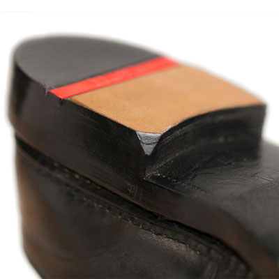 Gentleman's Corner an einem LLOYD Leder-Gummi Absatz