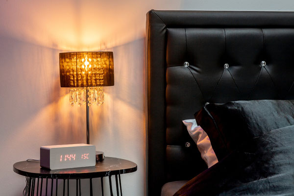 Chambre d'hôtel suite d'exception du Glam88, une ambiance intime pour une séjour romantique avec bain à remous dans les Vosges
