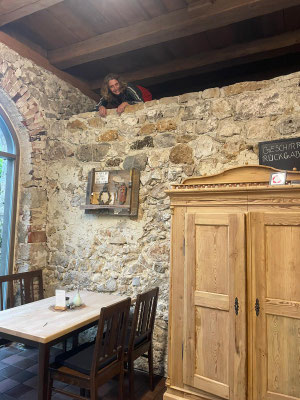 My daughter Camilla acrobaticly hanging one of my quite heavy ensembles