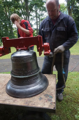 The bells are lifted one by one up into the tower.