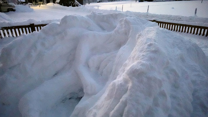 Snow sculpture: "Reclining Angel"