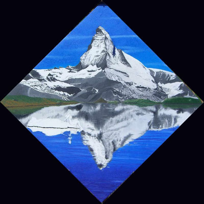 Mirror of the mountain in the lake