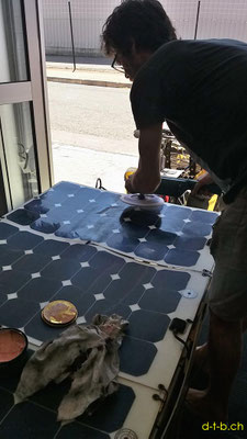 AU: Solatrike at MiCycles in Adelaide. Mic polish the solar panels