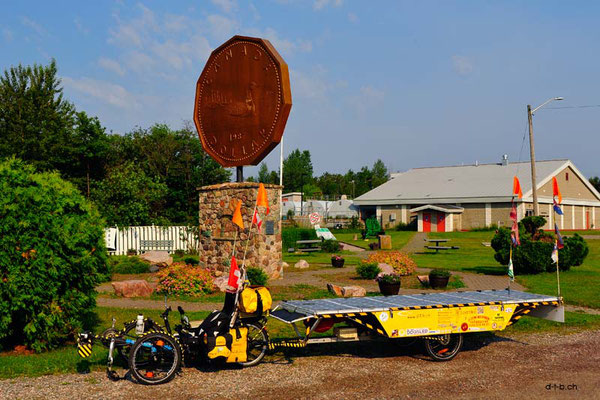 CA. Solatrike at The Loonie-Dollar monument in Echo Bay