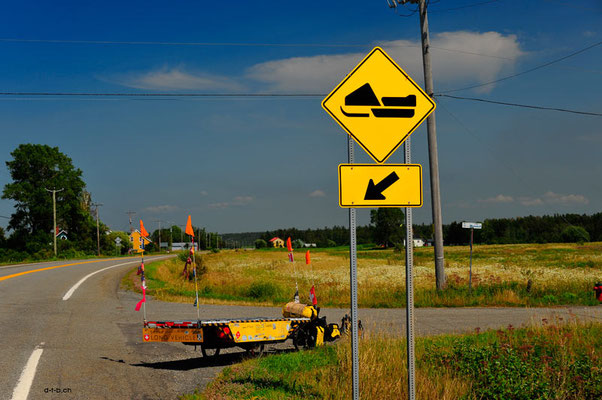 CA. Solatrike at a signpost for skidoos
