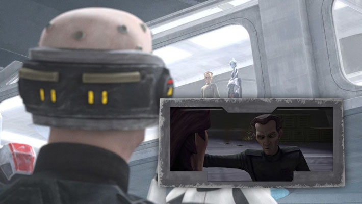 Echo wirft Tarkin einen finsteren Blick zu. Der Klon hat nicht viel übrig für den Imperialen, da er das Kommando auf Lola Sayu hatte. Hier wurde Echo so stark verletzt, sodass er jetzt ein Cyborg ist.