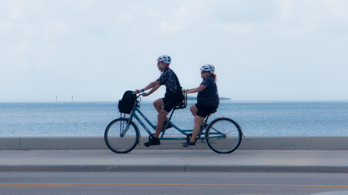 Couple on tandem bike, Key West, Florida