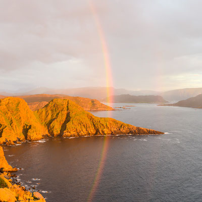 Beautiful rainbow from the top of the cliffs on Runde Island