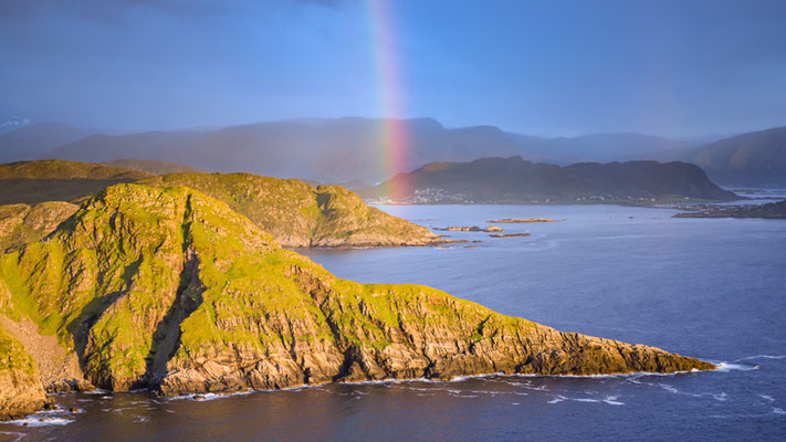 Beautiful rainbow from the top of the cliffs on Runde Island