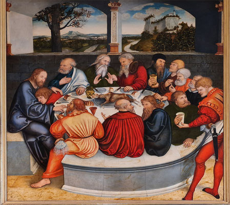 Zentrales Altarbild mit dem Abendmahl von Lucas Cranach, um 1539. Porträts von Reformatoren und Anhängern der Reformation als Jünger Jesu; vorne rechts Martin Luther als Junker Jörg, dem der Mundschenk (Lucas Cranach d. J.) den Becher reicht.