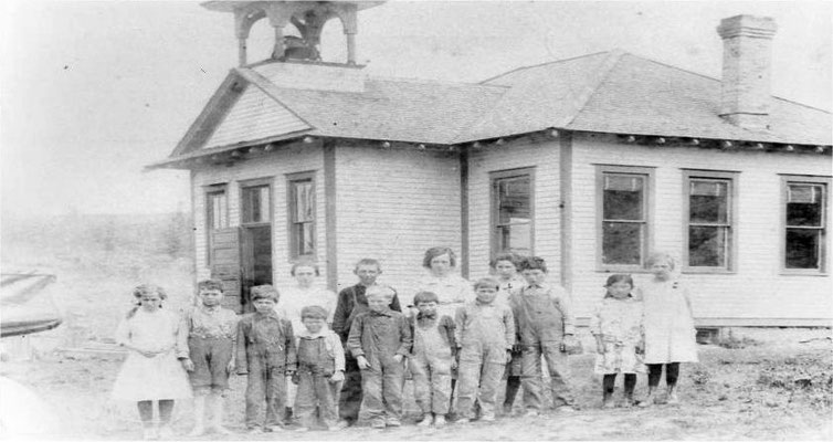 Back to School! The Frog Pond School, 1916, later moved to present location near the Foothills Schoolhouse (Millville School) to become the teachers cottage. Front row: ?, Gordon Hopper, Rollie Lindell, Ernest Hopper, ?, ?, Roy Lindell, John Hopper, Kikua