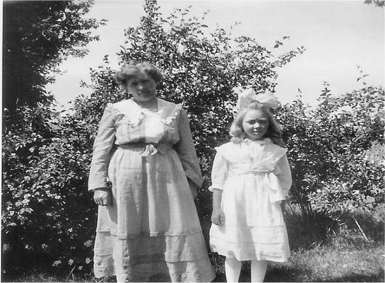 Mary Johnson and her daughter Vivian in their front yard near the intersection of Forker and Judkins Roads