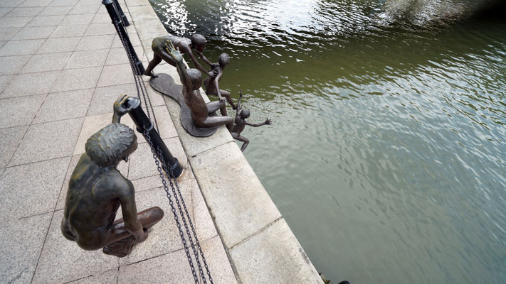 Playing by the Singapore river