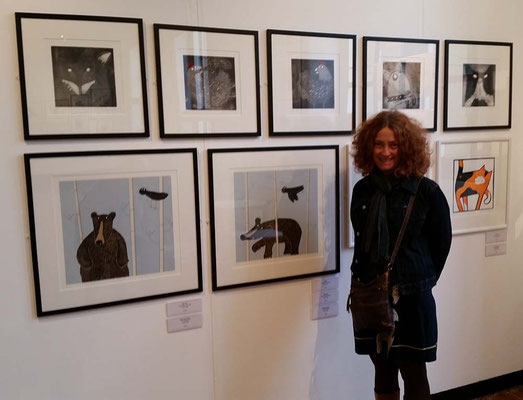 Lucy Gell with her cat, dog, fox, chicken and bear print