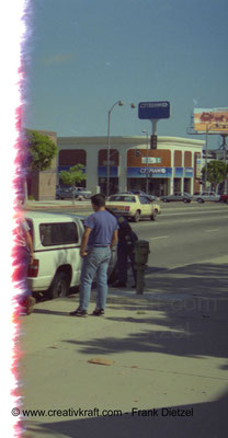Authorities question driver, 8739 S Sepulveda Blvd / S La Tijera Blvd, Westchester, Los Angeles, California 90045 with Citi Bank building, first picture on the film, June 1990