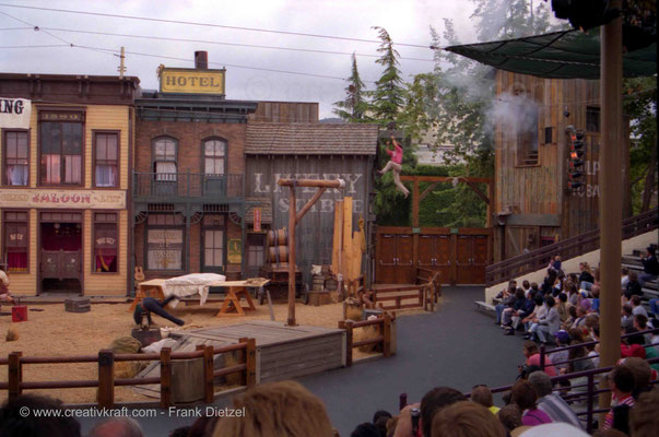 The Wild Wild Wild West Stunt Show: cowboy travelling on wire ropeway, Universal Studios Hollywood, Universal City, Los Angeles, California 91608, 6/1990 