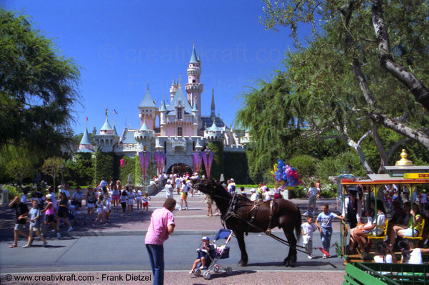Sleeping Beauty Castle (based on Neuschwanstein Castle, Germany), horse-drawn carriage, Disneyland, Anaheim, Los Angeles, California 92802