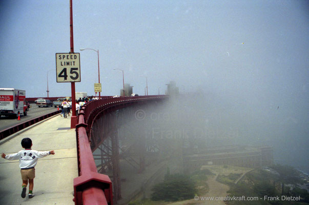 Golden Gate Bridge in fog, sidewalk, Presidio, San Francisco, CA, 94129