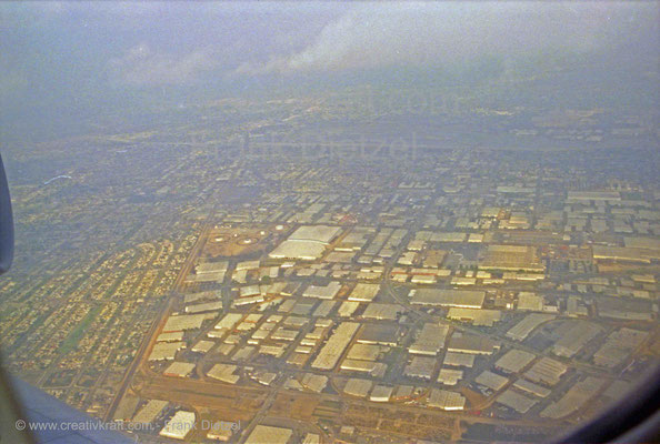 Los Angeles, California, PAN AM/Pan American flight, vicinity, industry storage houses, aerial view, 6/1990