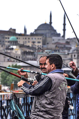 Fishing buddies on the Galata Bridge in Istanbul. Not many fish caught, but everyone was happy to be fishing!