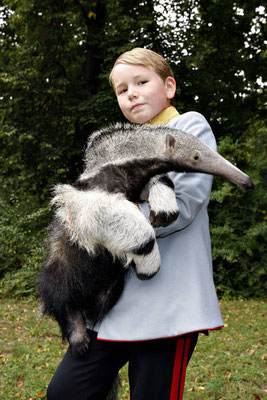 Berlin, 2008. Arthur Würzebesser posing with Adolpho, the new zoo star. 