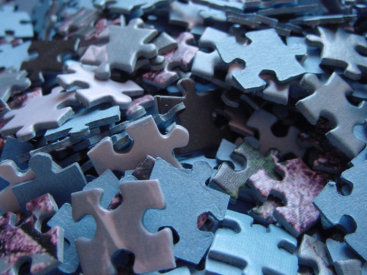 flickr.com "Puzzle" by Olga Berrios (license: https://creativecommons.org/licenses/by/2.0/legalcode;  Modifications made: Cropped photo) 