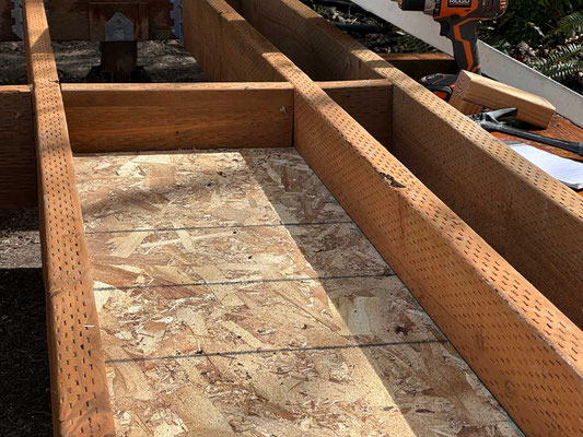 March 31, 2025. Once framed, plywood sheets were cut to fill each bay within the floor. This serves to prevent rodents from entering and damaging the foam insulation that will be placed on top.