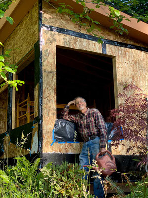 June 23, 2025. Watering some of the plants around the garden studio.