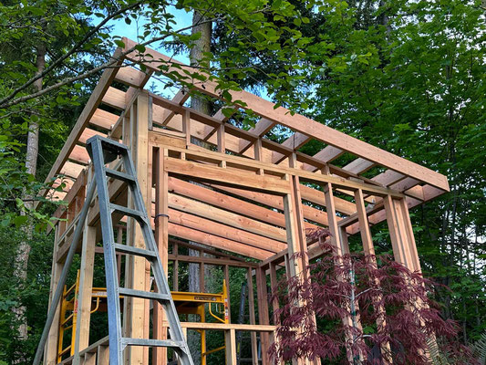 May 7, 2025. Exterior view of the completed roof framing.