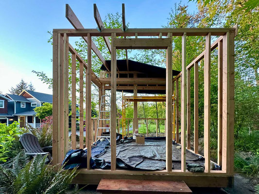 April 27, 2025. The back wall with the door opening.