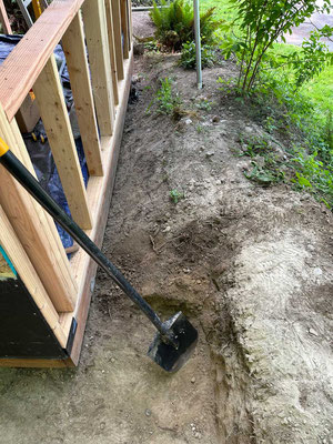 May 14, 2025. I needed more work space in front of the structure, so I spend a day digging-out a 2-foot trench in front of it.