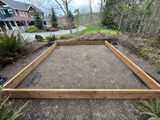 March 21, 2025. I purchased and placed for 10' x 10' x 8" pressure-treated boards in the clearing I had made at the top of the rise in our Japanese garden.