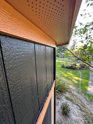 August 25, 2025. A trim board installed where the soffit meets the front wall. Note vented soffit.