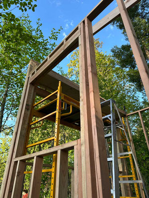 April 26, 2025. A view looking through the third wall, showing the scaffold that I purchased to help assemble the roof. 