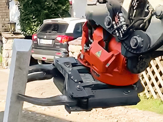 Pinza colocación bordillos con excavadora