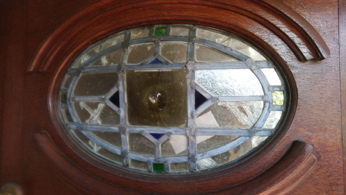 (Before repair) We correct damaged or bowed front door panel. 